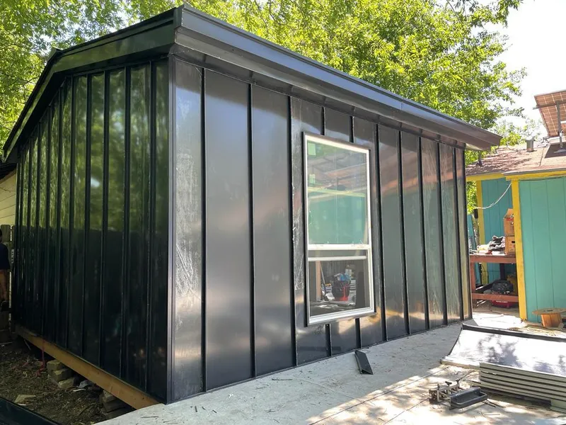 Black standing seam metal wall panels for Roof Inspection in North Haledon