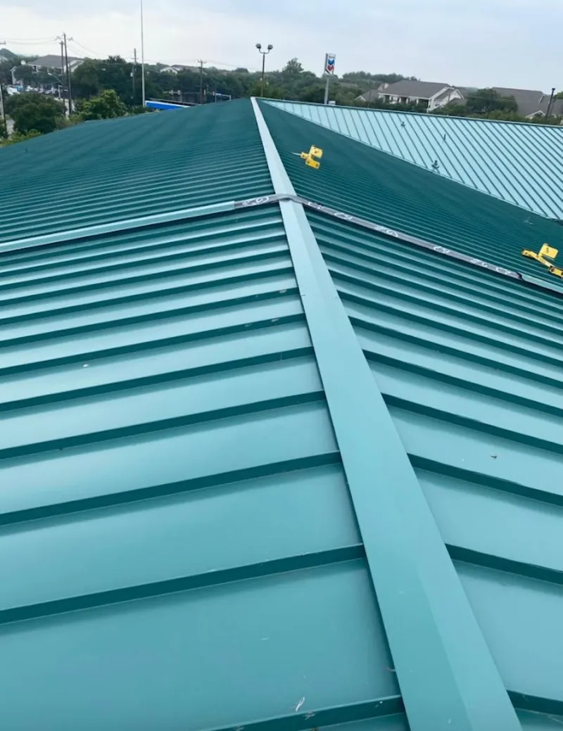 Green commercial metal roof ridge and valley for Metal Roof Repair in North Haledon